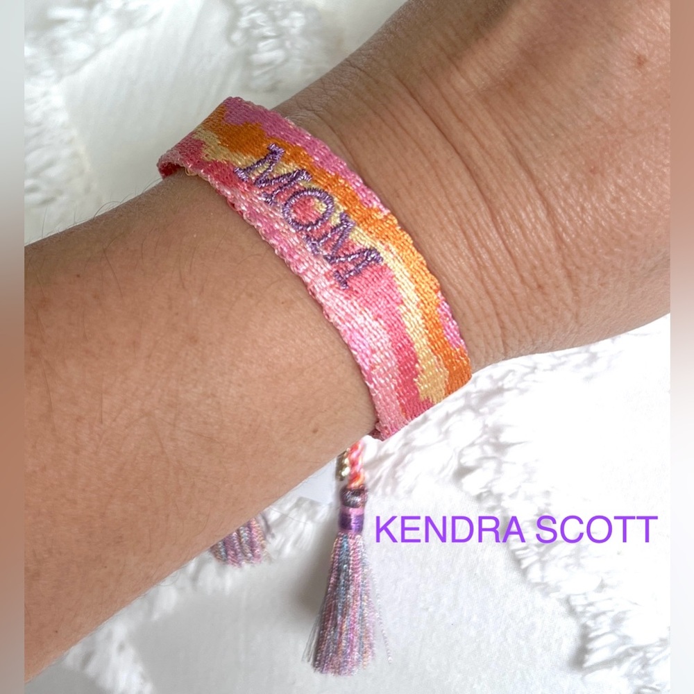 KENDRA SCOTT Mom Satin textile woven draw string tassels bracelet pink